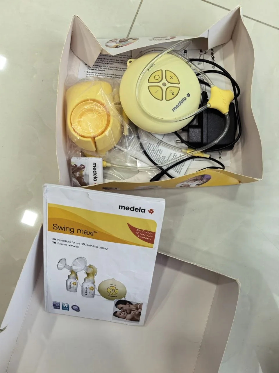 Молокоотсос Medela Swing Maxi